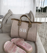 tan/beige tote bag with chain,